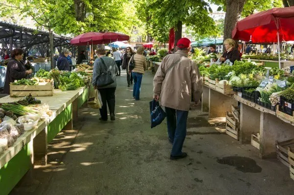 a local farmers market with vegetables for sale