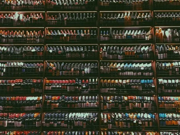 liquor store shelves stocked with bottles