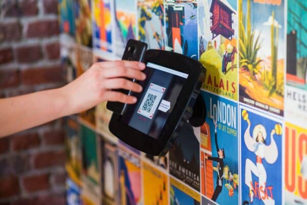 a customer scans a qr code for marketing purposes in-store
