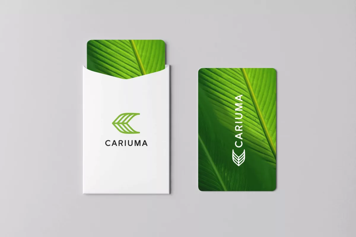a branded gift card and envelope from sneaker company Cariuma