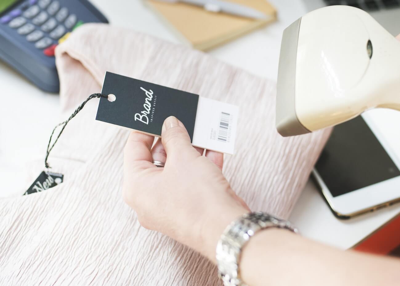 Barcode Scanner for POS System A barcode scanner scans a barcode on a price tag