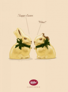an easter ad from Kafer Confiserie showing two chocolate bunnies