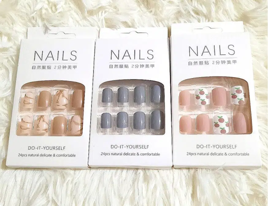 an example of a DIY bundle with different types of stick on artificial nails