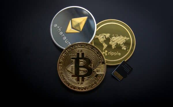 three different cryptocurrency coins are shown