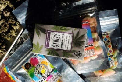 a mix of different cannabis products including vape cartridges and edible gummies