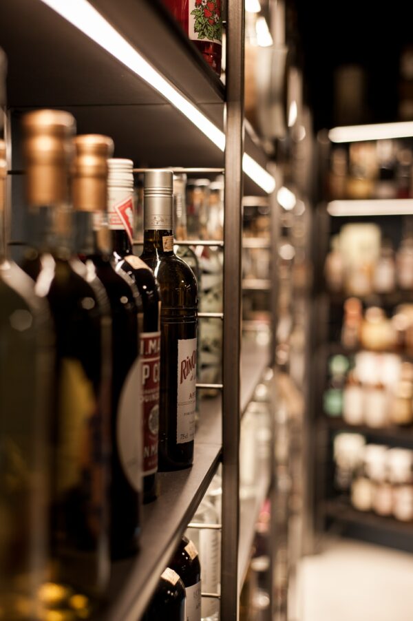 a photo showing bottles in a liquor store
