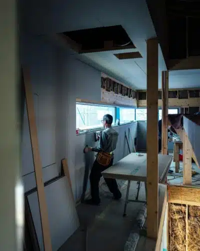 a construction worker builds the interior of a Washington State dispensary
