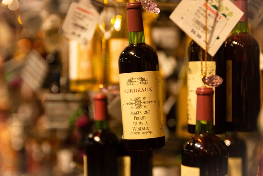 bottles hang in a wine shop