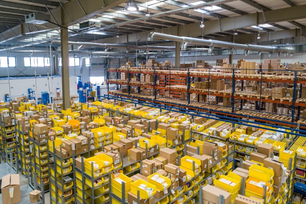 a large warehouse storage facility with different products in bins on shelves