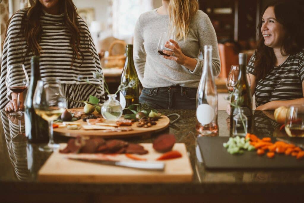 a wine tasting inside a retail store with some hors d'oeuvres