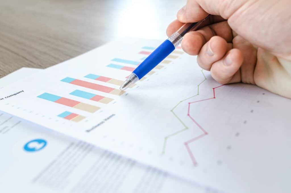 a retailer looks over graphs showing average unit retail figures