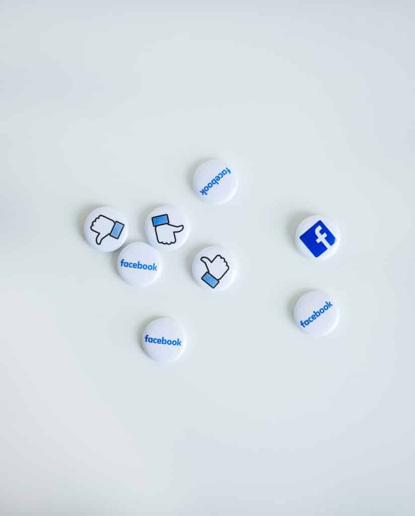 Buttons with Facebook logos and "like" icons