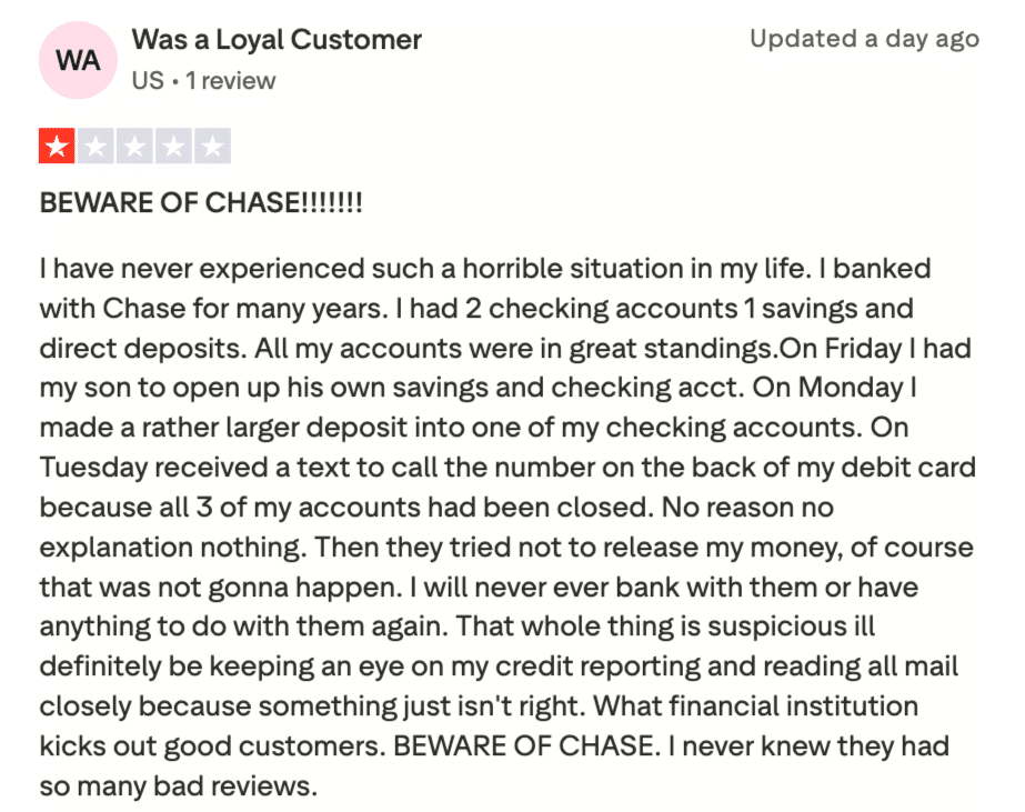 Screenshot of a 1-star Trustpilot review from a former long-time Chase customer whose checking, savings, and debit accounts were all closed without notice or explanation, with the bank initially refusing to release their funds.